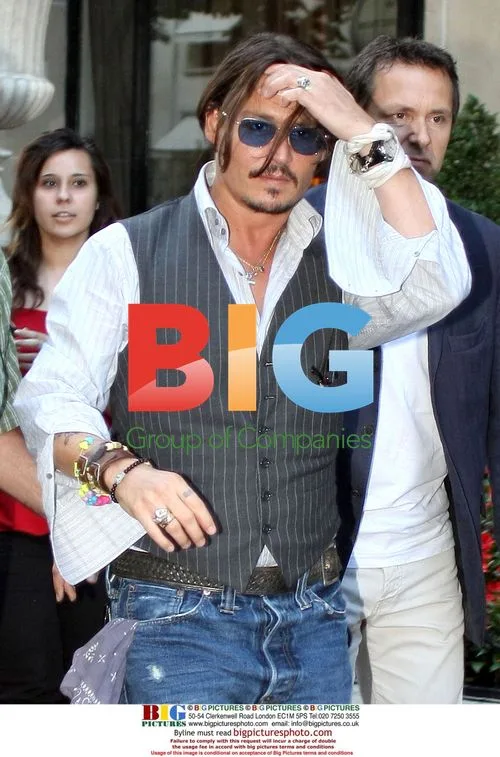 Johnny Depp leaves Paris hotel