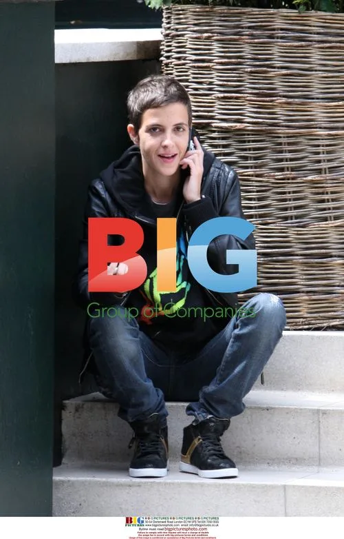 DJ Sam Ronson on her phone outside London hotel
