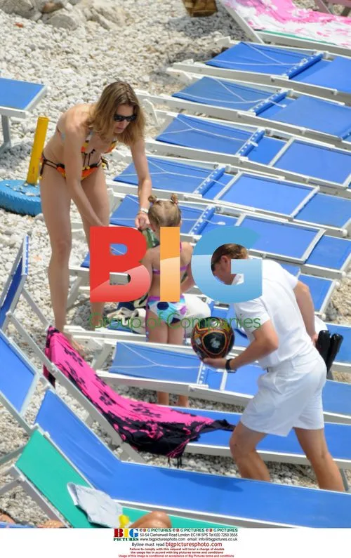 Steffi Graf relaxes on beach with kids