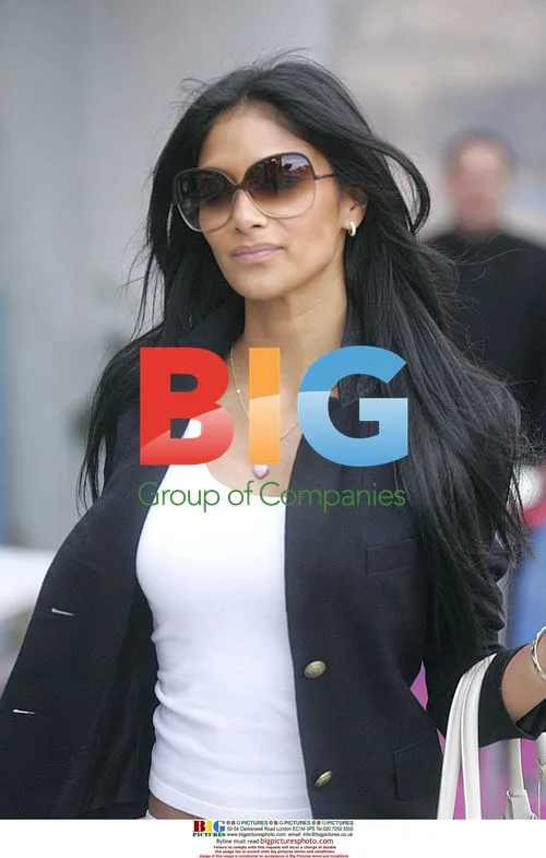 Nicole Scherzinger shops at Adriano Goldschmied