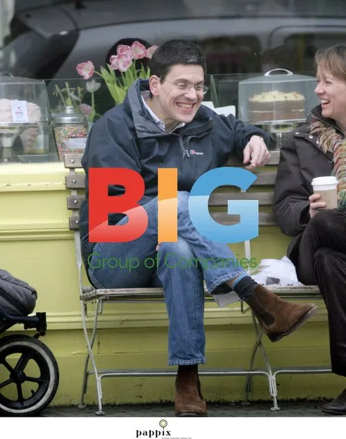 David Miliband and wife Louise enjoy coffee with kids