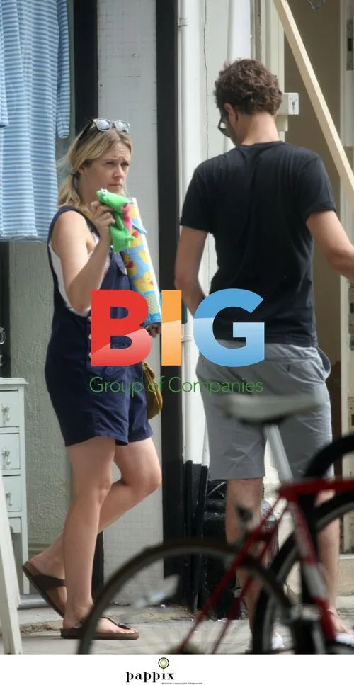 Edith Bowman and Tom Smith with baby out in London