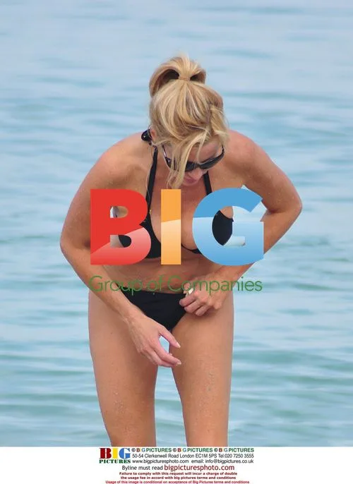 Kelsey Grammer at the Beach with Family