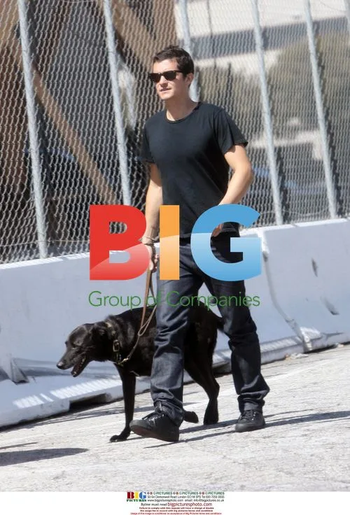 Orlando Bloom and Miranda Kerr with dog