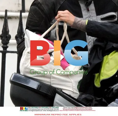 Adrian Chiles and Christine Bleakley spotted leaving flat