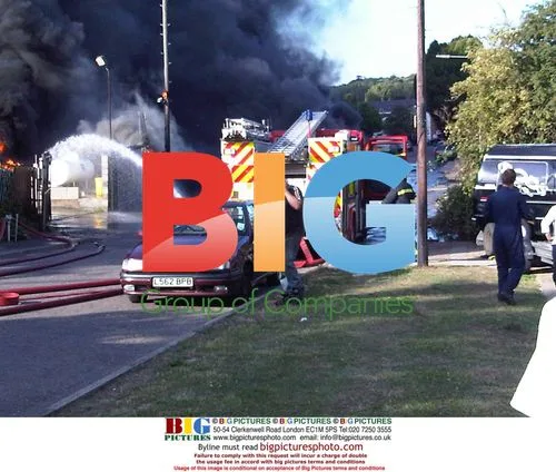 Firefighters Tackle Blaze at Garage