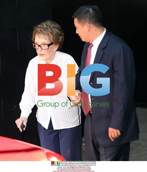 Nancy Reagan assisted leaving hotel