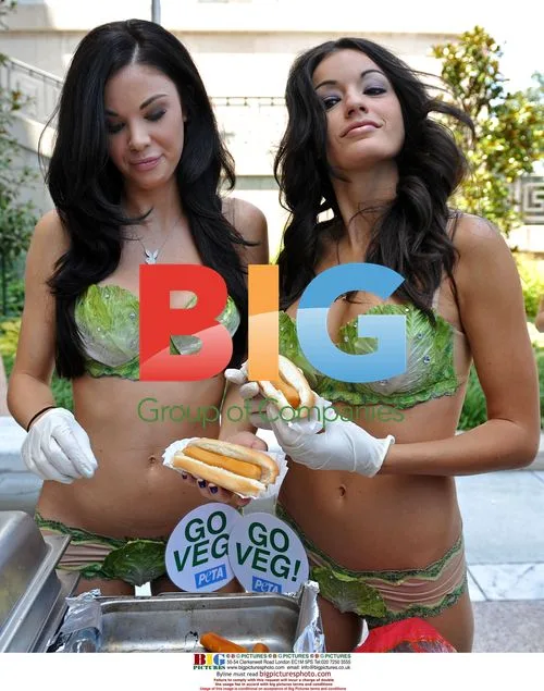 Playboy Playmates serve veggie hot dogs