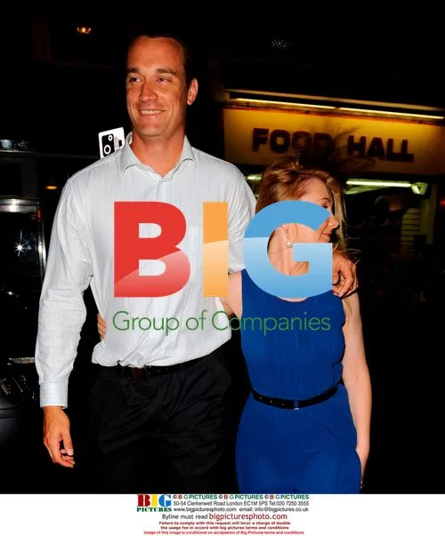 Stuart Clark leaves London restaurant with girlfriend