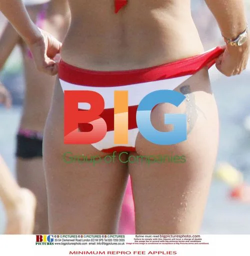 Davina McCall on Beach with Family