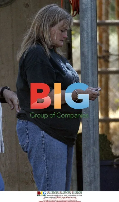 Debbie Rowe collects horse sample