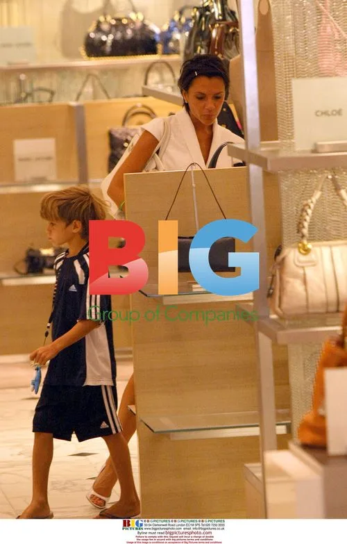 Victoria Beckham Shopping with Son Cruz