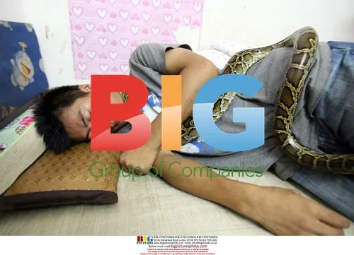 Man with exotic pets in China
