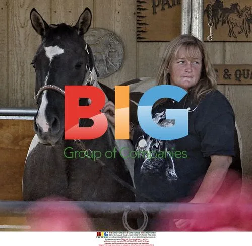 Debbie Rowe takes horse sample for doctor
