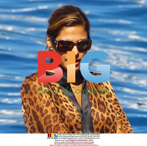 Eva Mendes and George Gargurevich on boat with Dolce and Gabbana