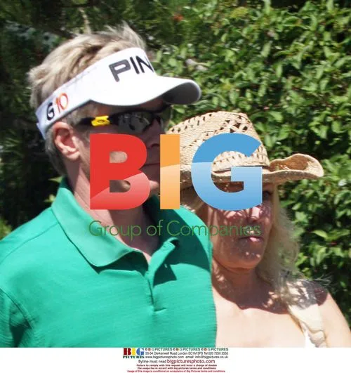 Heather Locklear watches Jack Wagner at golf tournament