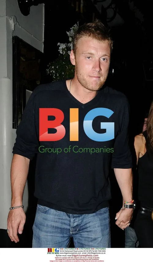 Cricketer Flintoff Leaves Punchbowl with Wife