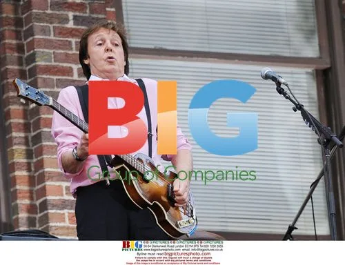 Paul McCartney performs outside Ed Sullivan Theatre