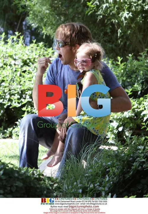 Larry Birkhead and Dannielynn play at park