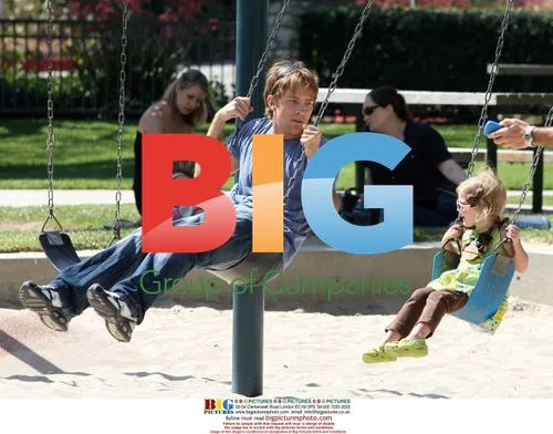 Larry Birkhead and daughter Dannielynn playing in park