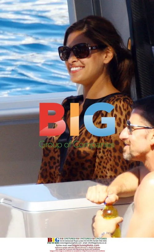 Eva Mendes and boyfriend on boat with Dolce and Gabbana
