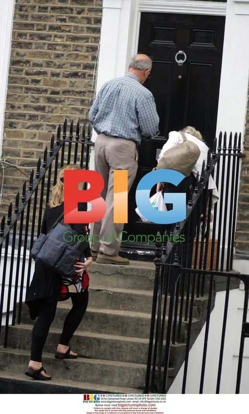 Pregnant GMTV Host Kate Garraway Walks Home