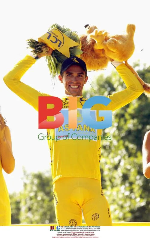 Armstrong and Contador on Paris podium