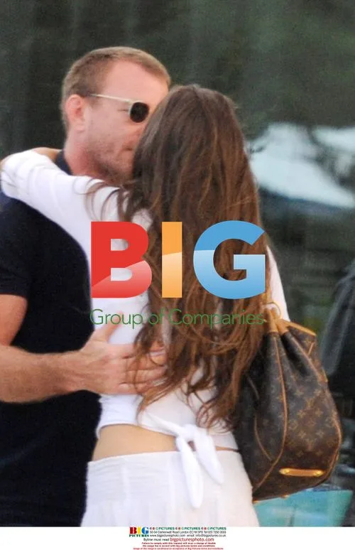 Guy Ritchie relaxes with twins in Italy
