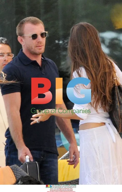 Guy Ritchie relaxes with twins in Italy