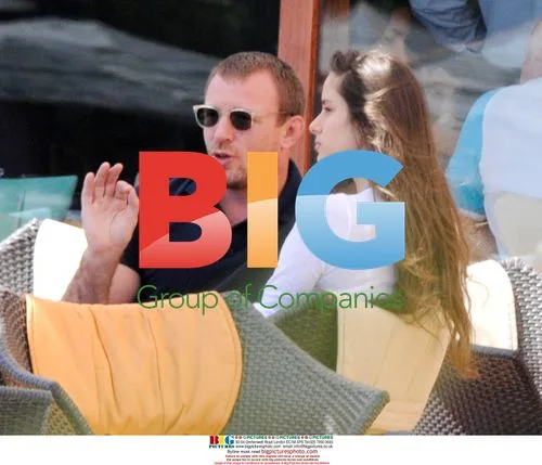 Guy Ritchie with twin sisters in Italy