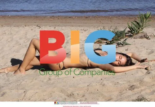 Twin Sisters Posing Sexily on Beach