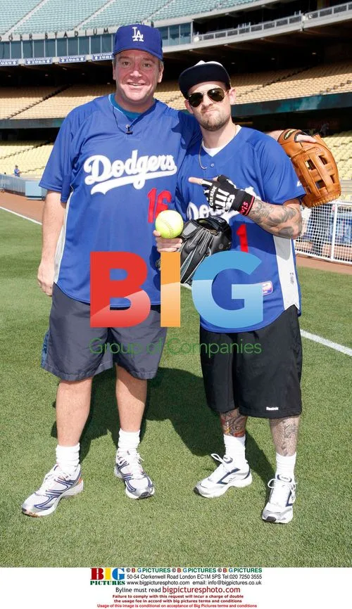 Joel Madden and Tom Arnold at celebrity softball game