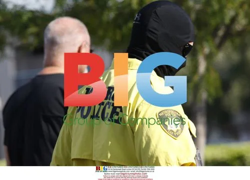 DEA and Police Search Conrad Murray's Office