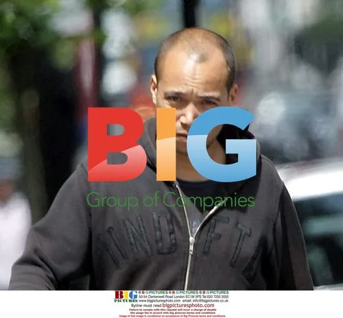 Singer Finley Quaye Charged for Biting