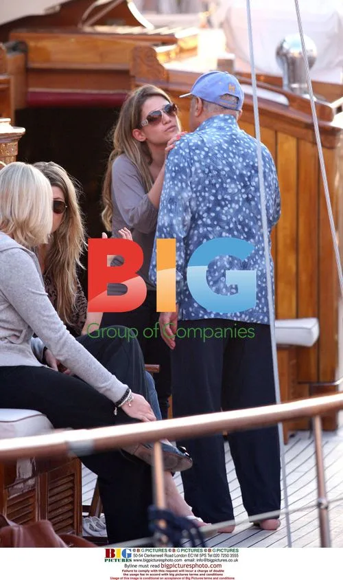 Mohamed Al Fayed on Yacht with Two Women