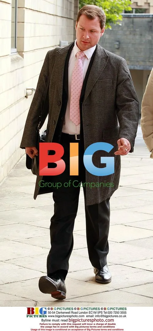 Guy Button arrives at Northampton court
