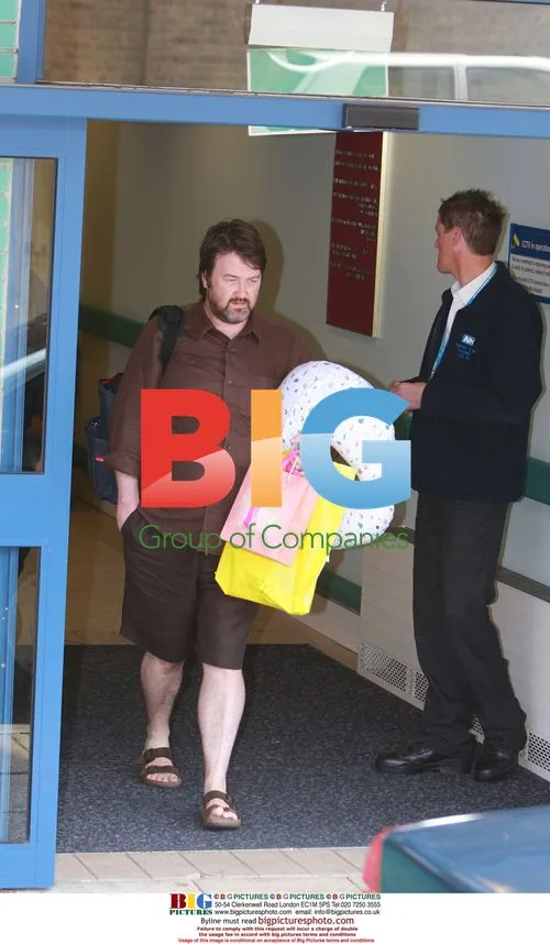 Kate Garraway leaves hospital with husband and newborn