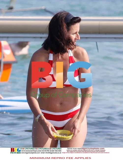 Davina McCall with family on beach in France