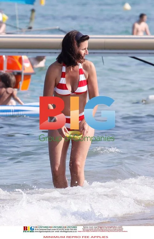 Davina McCall and family on beach in France