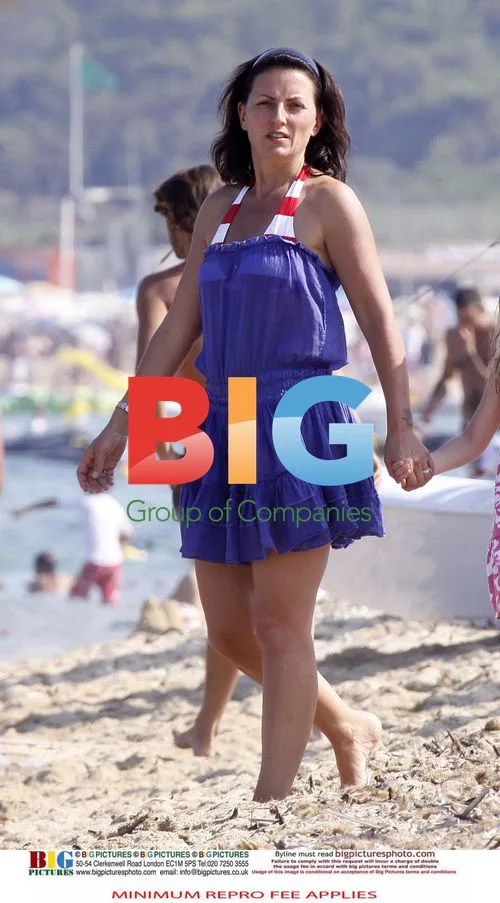 Davina McCall on Beach with Family