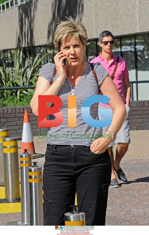 GMTV presenter Penny Smith on mobile phone