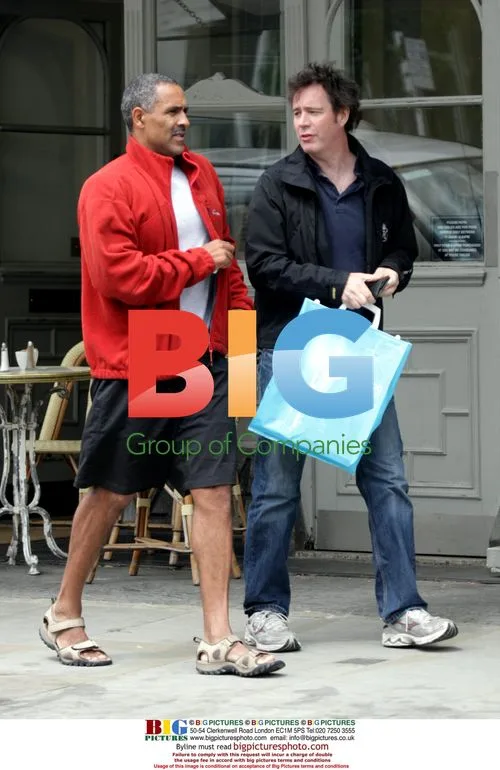 Daley Thompson out with friend in Notting Hill