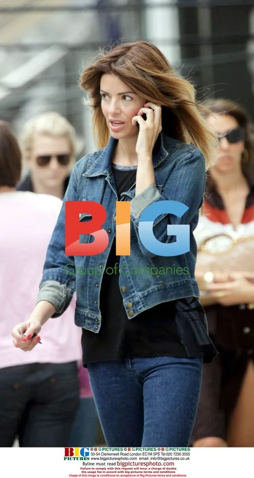 Sarah Mcdonald chats on phone in Notting Hill