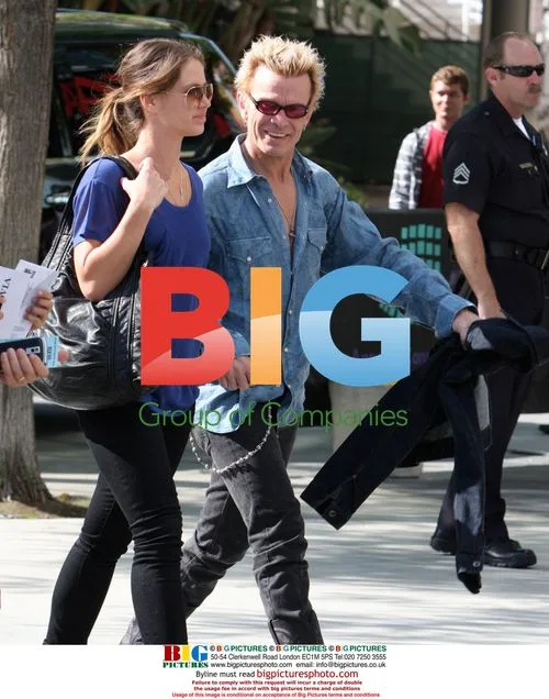 Billy Idol & female arriving to NBA Finals