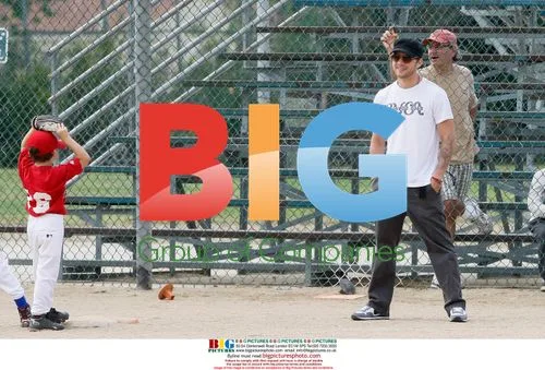 Ryan Phillipe and Abbie Cornish with Ryan's son playing baseball