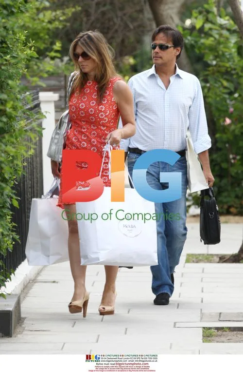 Liz Hurley returns from Prada shopping trip
