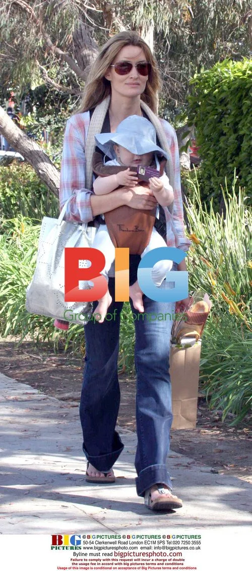 Natasha Mcelhone shopping with baby