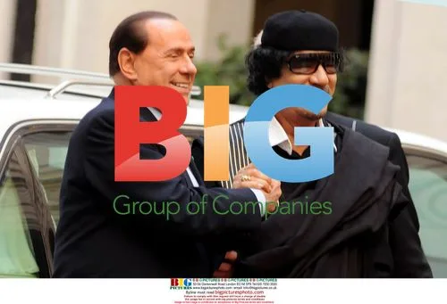 Gaddafi meets Berlusconi in historic Italy visit