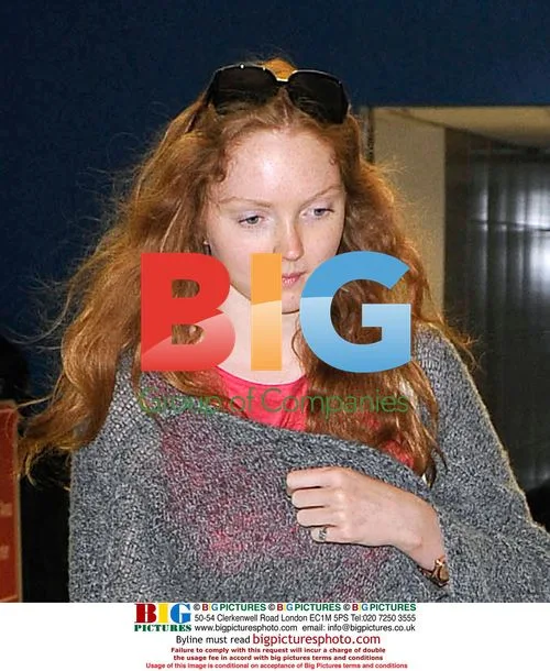 Lily Cole looking frumpy at airport