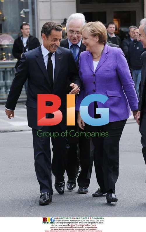 Sarkozy Welcomes Merkel in Paris
